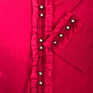 Bright pink snap up sweater